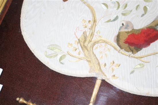 A Victorian silk and felt work hand screen, decorated with exotic birds, framed, 40 x 38cm